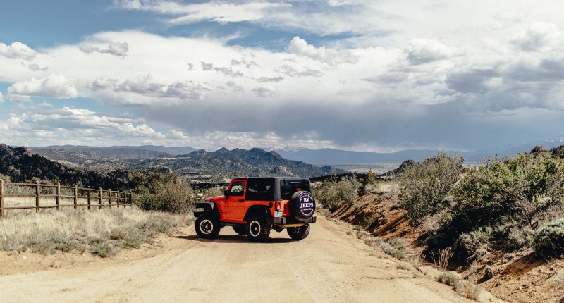 Jeep stopped on a scenic Colorado high-country road